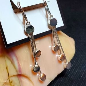 Dana Buchman silver tone drop earrings